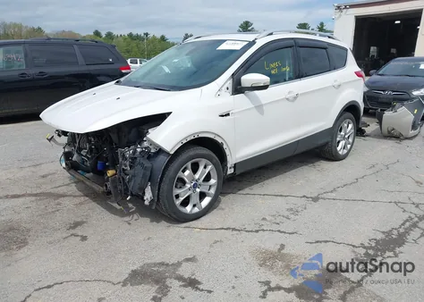 2016 Ford Escape Titanium z USA, uszkodzony, nr VIN 1FMCU9J98GUA00832
